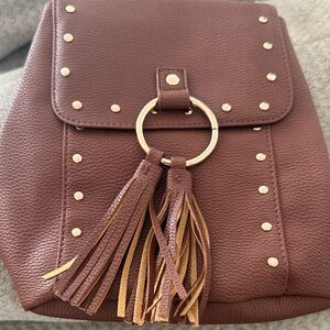 Justice Brown Tassel Crossbody Bag with Gold Hardware